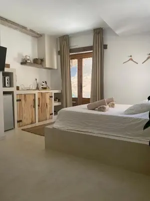 Cama o camas de una habitación en Apartamentos Nomad Home