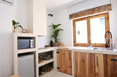 Una cocina o zona de cocina en Apartamentos Nomad Home