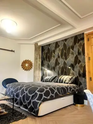 Cama o camas de una habitación en Estiloso estudio en Gran Via, vistas al Huerva