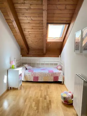 Cama o camas de una habitación en Coqueto dúplex - ORDESA l WIFI l VISTAS l GARAJE