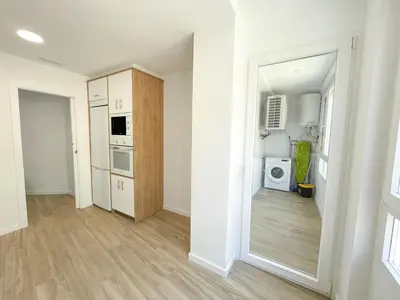 Una cocina o zona de cocina en Apartamentos Zaragoza Gran Vía 3000