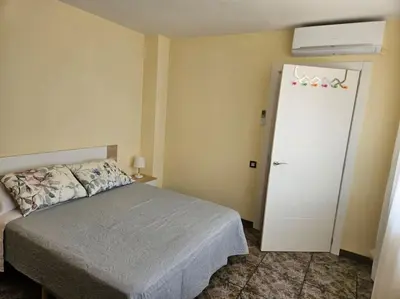 Cama o camas de una habitación en casa en Alforja