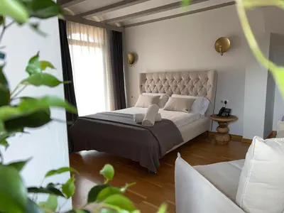 Cama o camas de una habitación en Hotel Palacio Barón de Andilla