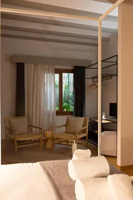 Una televisión o centro de entretenimiento en Hotel Palacio Barón de Andilla