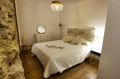 Cama o camas de una habitación en Apartamentos Almada - calle Alfonso - Plaza SAS