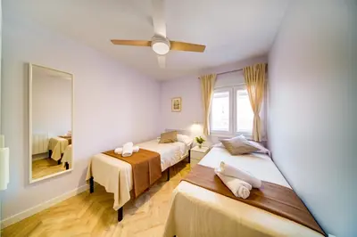 Cama o camas de una habitación en Apartamento San Lazaro a 5 Min Pabellon Principe Felipe con opcion a Parking