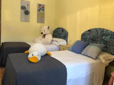 Cama o camas de una habitación en Apartamentos MyM