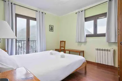 Cama o camas de una habitación en C1 eraclau - Era Escaleta con WiFi en VIELHA