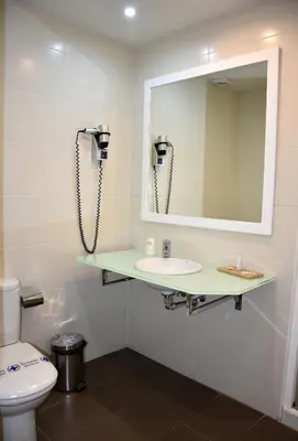 Un baño de Hotel y Apartamentos SNÖ Isaba