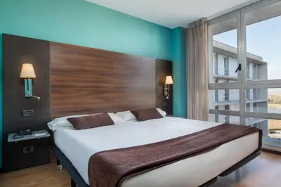 Cama o camas de una habitación en Eurostars Rey Fernando