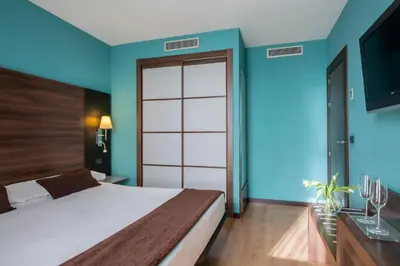 Cama o camas de una habitación en Eurostars Rey Fernando