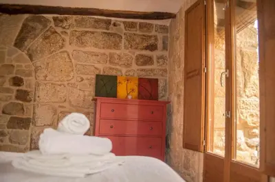 Cama o camas de una habitación en Patio con barbacoa: disfruta del Matarraña