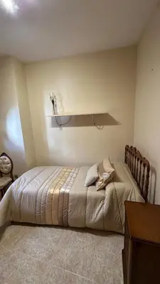 Cama o camas de una habitación en Ca la Cabrera