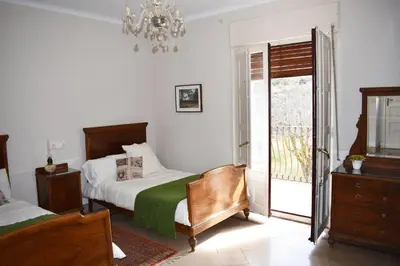Cama o camas de una habitación en Casa para 12 con jardín en Chía, Benasque La Casa del Tilo