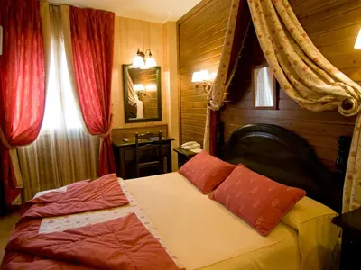 Cama o camas de una habitación en Hotel Pradas Ordesa