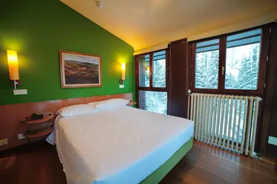 Cama o camas de una habitación en SNÖ Hotel Candanchú