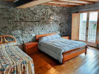 Cama o camas de una habitación en Magi, Casa rural con encanto para familias y amigos