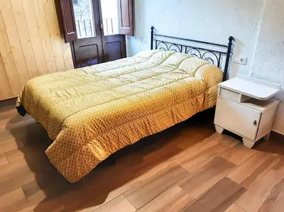 Cama o camas de una habitación en Magi, Casa rural con encanto para familias y amigos
