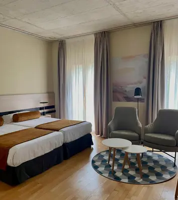 Cama o camas de una habitación en Balneario de la Albotea