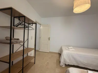 Cama o camas de una habitación en 18 Torres Santa Cruz