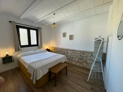 Cama o camas de una habitación en Casa Don Pelayo Boutique Apartments & Café