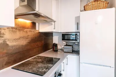 Una cocina o zona de cocina en C2 eraclau - Eth Santet en VIELHA