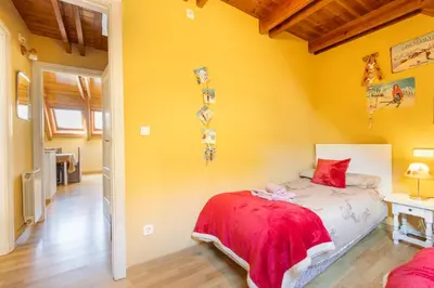 Cama o camas de una habitación en V1 eraclau - Eth Artigarix con parking en VILAC