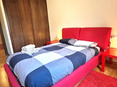 Cama o camas de una habitación en Apartament familiar amb vistes by RURAL D'ÀNEU