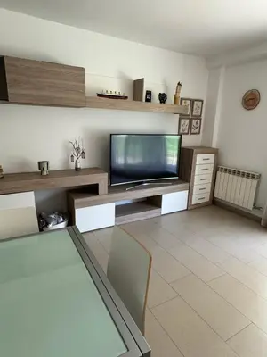 Una televisión o centro de entretenimiento en Apartamento Besiberri en Vilaller Ideal familias