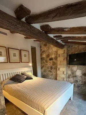 Cama o camas de una habitación en Ático con terraza en Capçanes
