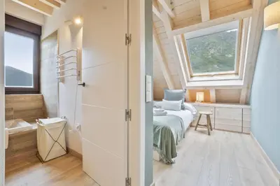 Cama o camas de una habitación en Luderna - Tríplex Amitges