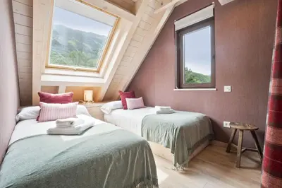 Cama o camas de una habitación en Luderna - Tríplex Amitges