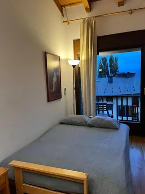 Cama o camas de una habitación en Apartamento Margalida en Cerler, Pirineo Huesca