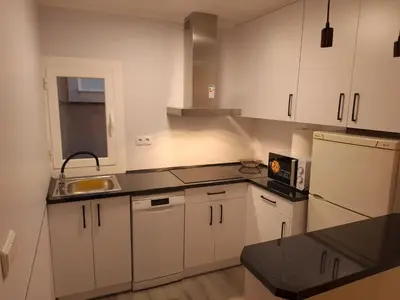 Una cocina o zona de cocina en Apartamento El Cortijo