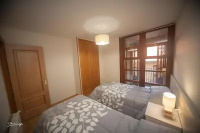 Cama o camas de una habitación en Apartamento Pradas Jaca