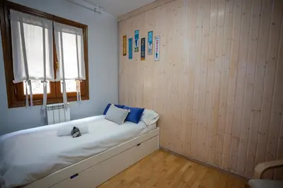 Cama o camas de una habitación en Casa Senda by Cardi Suites.