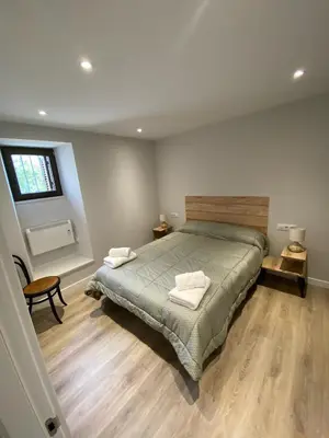 Cama o camas de una habitación en Amama Etxea
