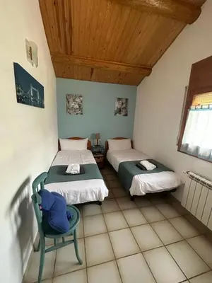 Cama o camas de una habitación en Casa de los avellanos