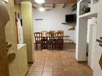 Una televisión o centro de entretenimiento en Can Bareta