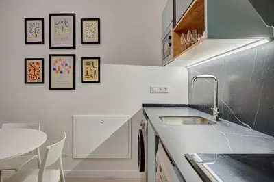 Una cocina o zona de cocina en Apartamentos Panda by Clabao