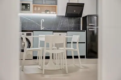 Una cocina o zona de cocina en Apartamentos Panda by Clabao
