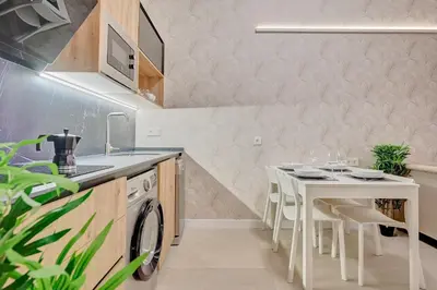 Una cocina o zona de cocina en Apartamentos Panda by Clabao