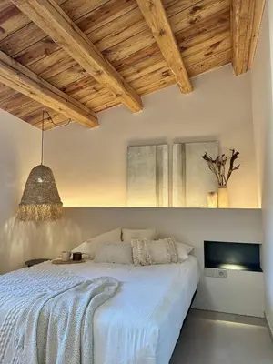 Cama o camas de una habitación en CAL PASSACOSTES cb