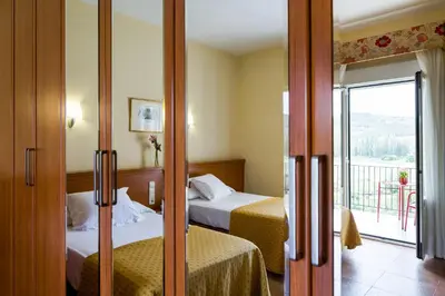 Cama o camas de una habitación en Balneario de Fitero - Hotel Bécquer