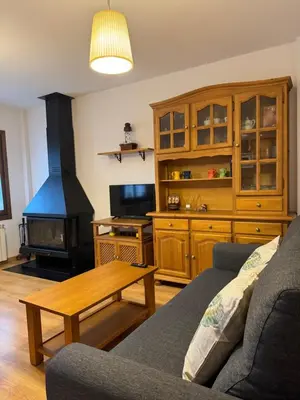 Una televisión o centro de entretenimiento en Apartamento La Calma
