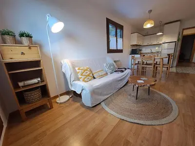 Cama o camas de una habitación en LA GINESTA 3, Apartaments de muntanya