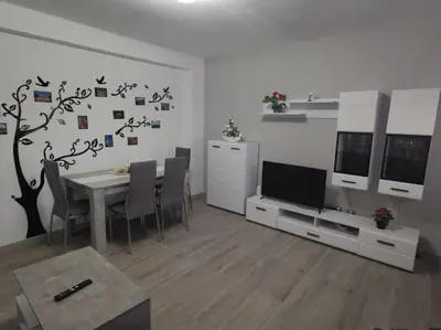 Una televisión o centro de entretenimiento en Apartamento con Jacuzzi: El Rincón de las Delicias