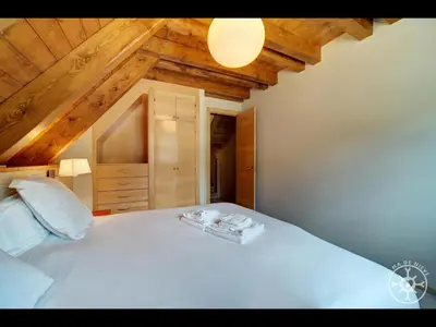 Cama o camas de una habitación en CASA ARROQUETS de Alma de Nieve