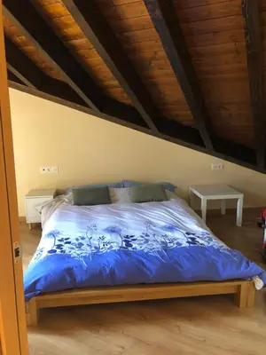 Cama o camas de una habitación en Vivienda en Escarrilla