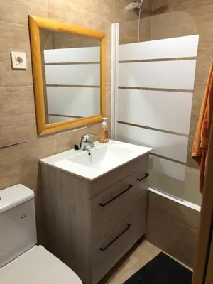 Un baño de Vivienda en Escarrilla